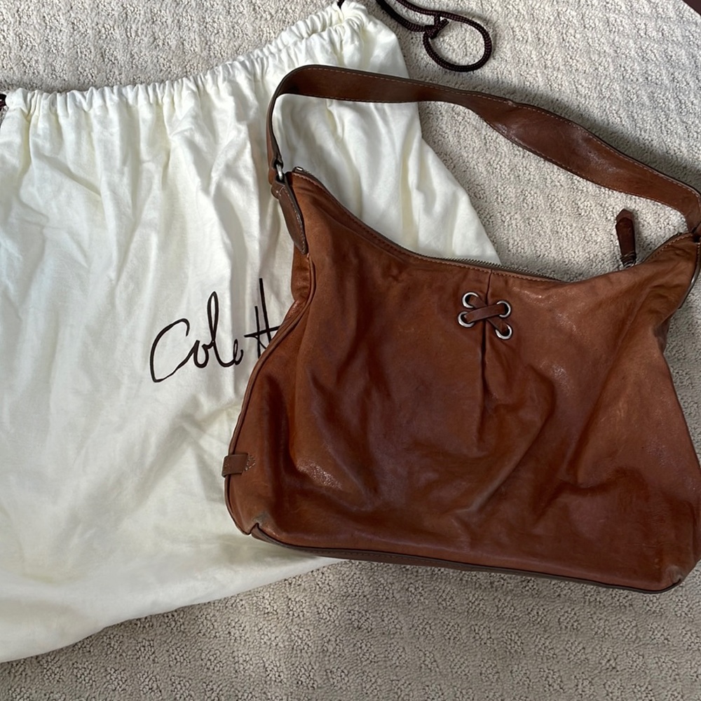 Cole Haan tan leather purse with original bag protector